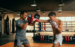 The Art of the Feed: How to Hold Focus Mitts Safely (Without Ruining Your Wrists)