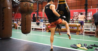 How to Use Boxing Bag Drills to Improve Your Clinch Game