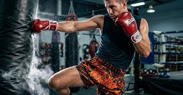 The "Pop" vs. The "Thud": How 14 oz Boxing Gloves Feel During High-Volume Bag Work