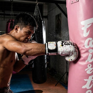 Unleash Your Inner Fighter: A Beginner’s Guide to Heavy Bag Training (No Coach Needed!)